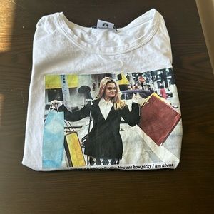 White “Clueless” tshirt.